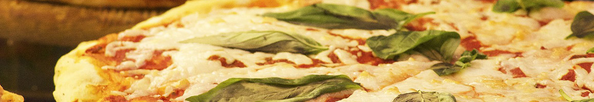 Eating Italian Pizza at Italian Touch Pizza restaurant in Woodstock, VA.